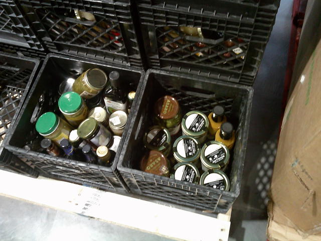 Glass jars in crates.